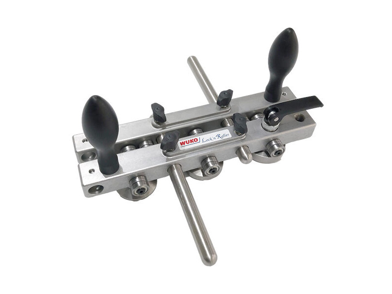 Wuko Lock n' Roller 1040 tool for precise seam closing with adjustable pressure and ergonomic handholds